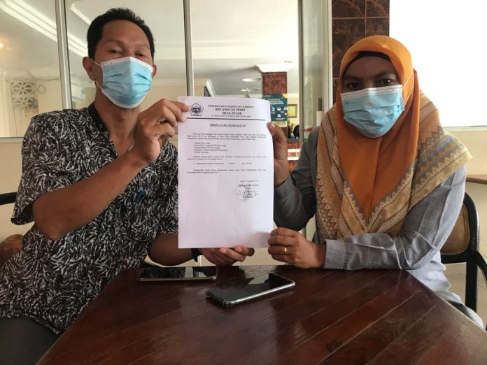 Aparat Desa Sugie menunjukkan hasil kesepakatan